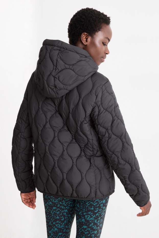 Mujer - Chaqueta acolchada con capucha - negro