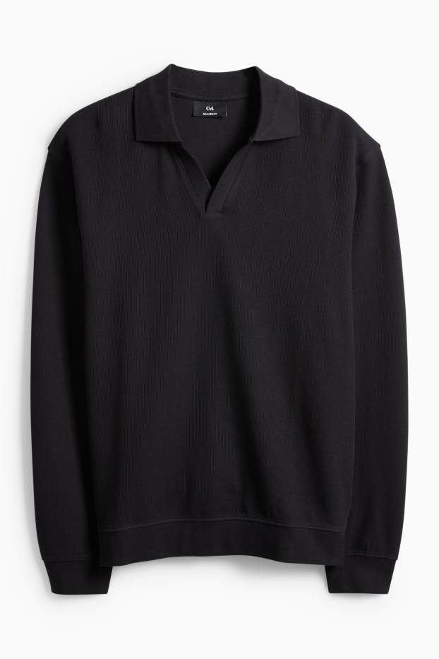 Hommes - Polo à manches longues - en maille - relaxed fit - finition côtelée - noir