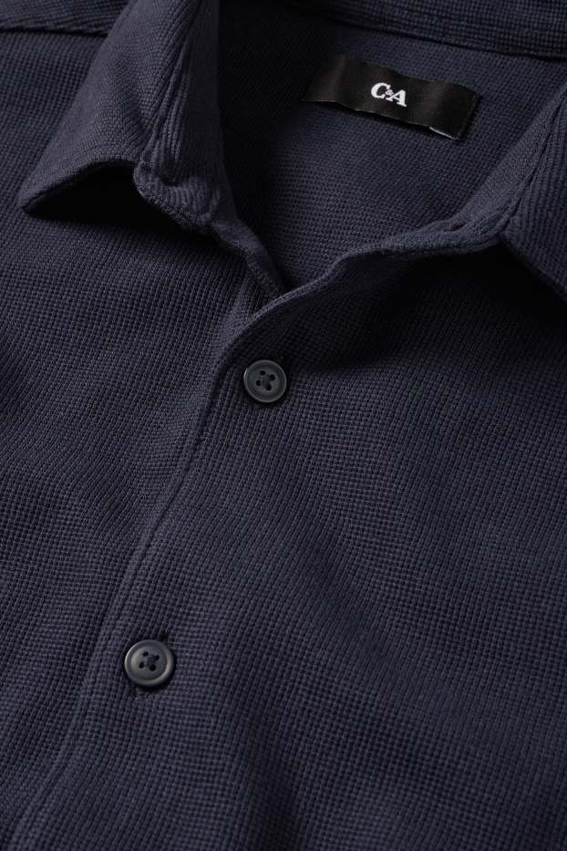 Hommes - Chemise - regular fit - col kent - finition texturée - bleu foncé