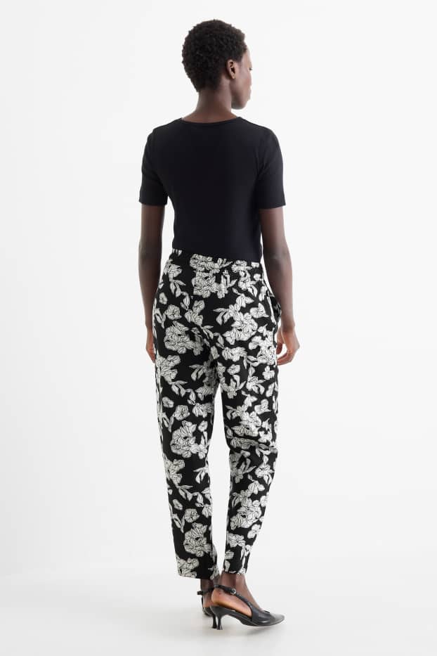 Damen - Stoffhose - High Waist - Tapered Fit - geblümt - schwarz / weiss