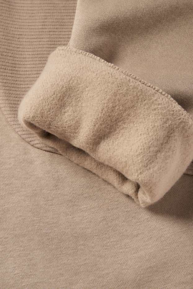 Nen - Pantalons de xandall - marró clar