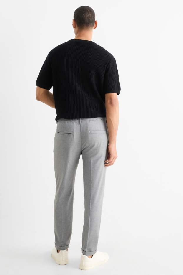 Hommes - Chino - tapered fit - finition texturée - gris