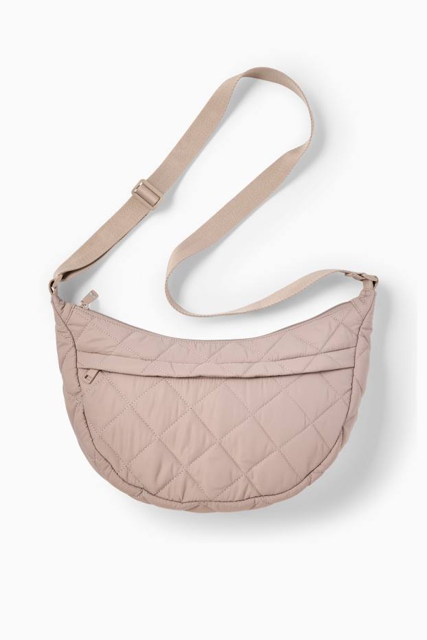 Dona - Bandolera enconxada - beix clar