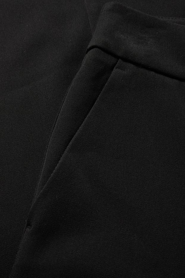 Dames - Pantalon - mid waist - flared - zwart