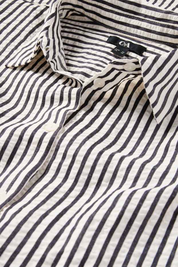 Dona - Brusa - de ratlles - negre/beix