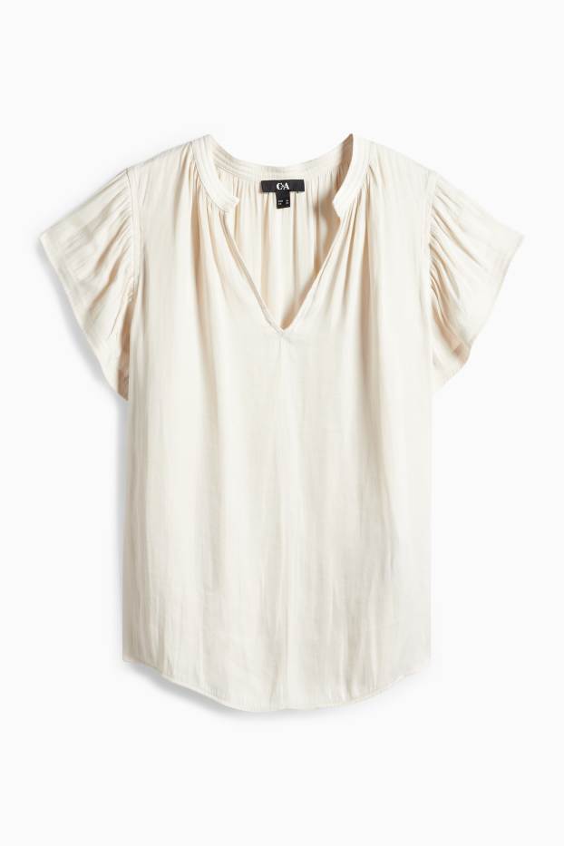 Dona - Brusa amb el coll en punta - blanc trencat