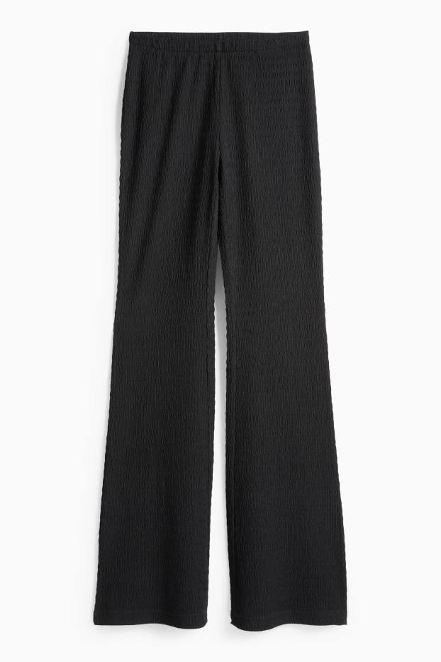 Damen - Flared Leggings - strukturiert - schwarz