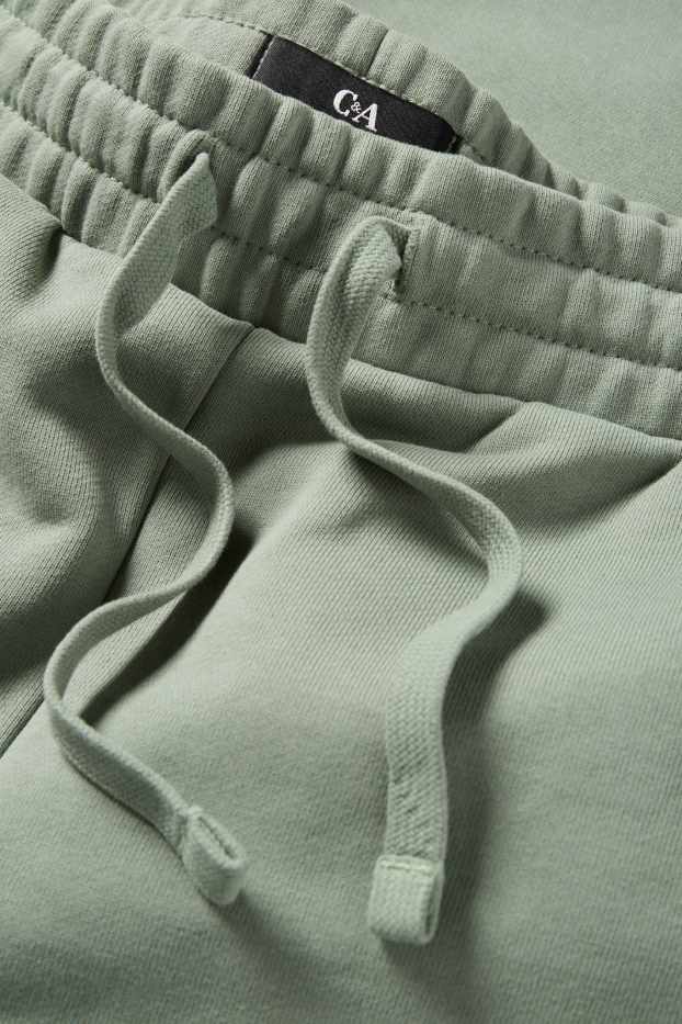 Home - Pantalons curts de xandall - verd clar