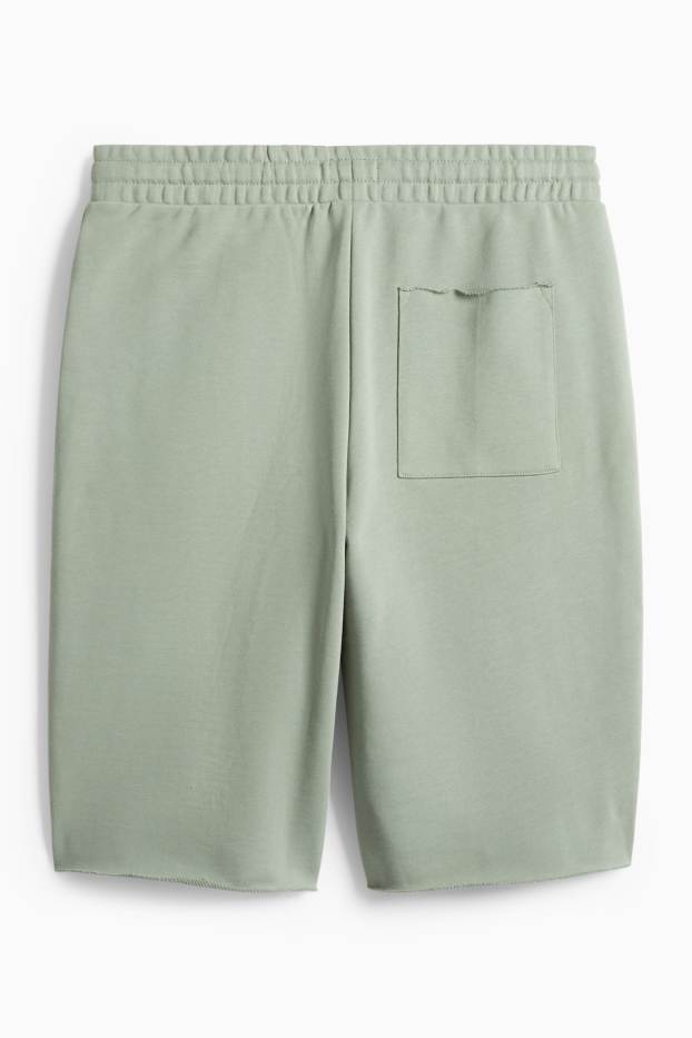 Home - Pantalons curts de xandall - verd clar