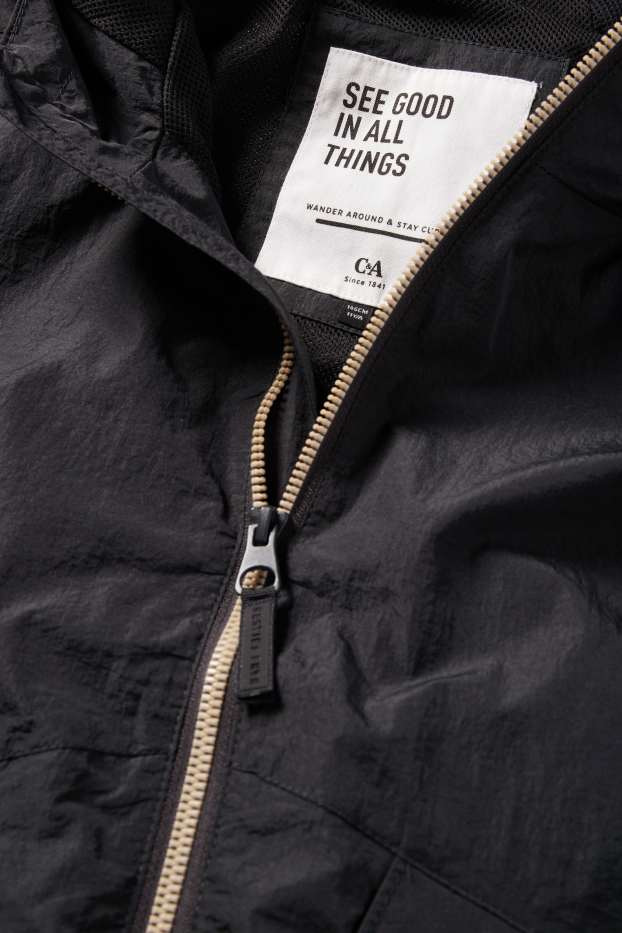 Kinder Mädchen - Jacke mit Kapuze - wasserabweisend - schwarz