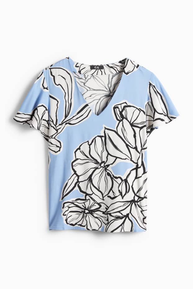 Dona - Brusa amb coll en punta - de flors - blau clar