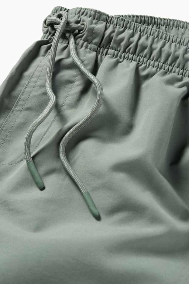 Herren - Badeshorts - grün