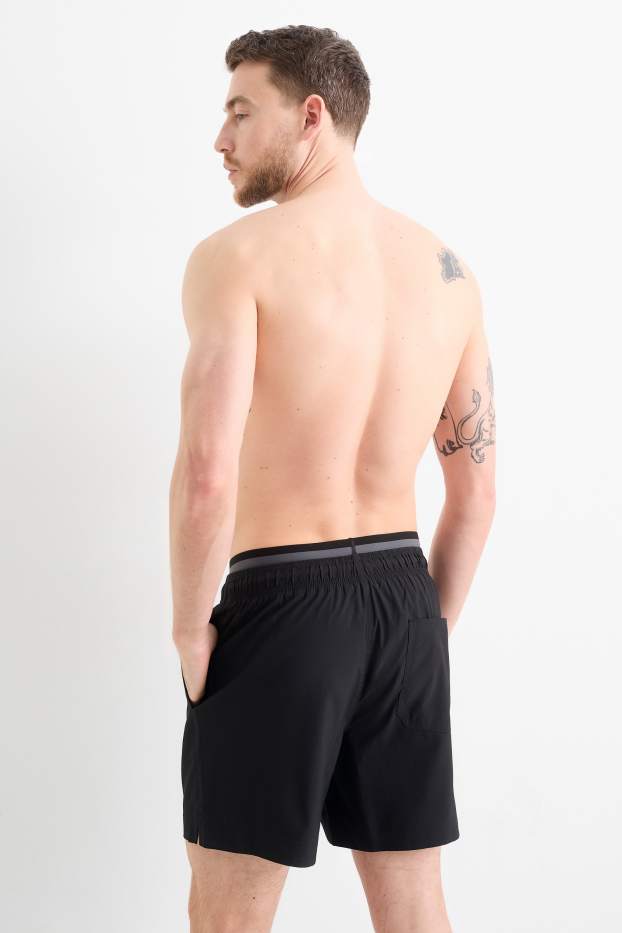 Hommes - Short de bain - look 2-en-1 - noir