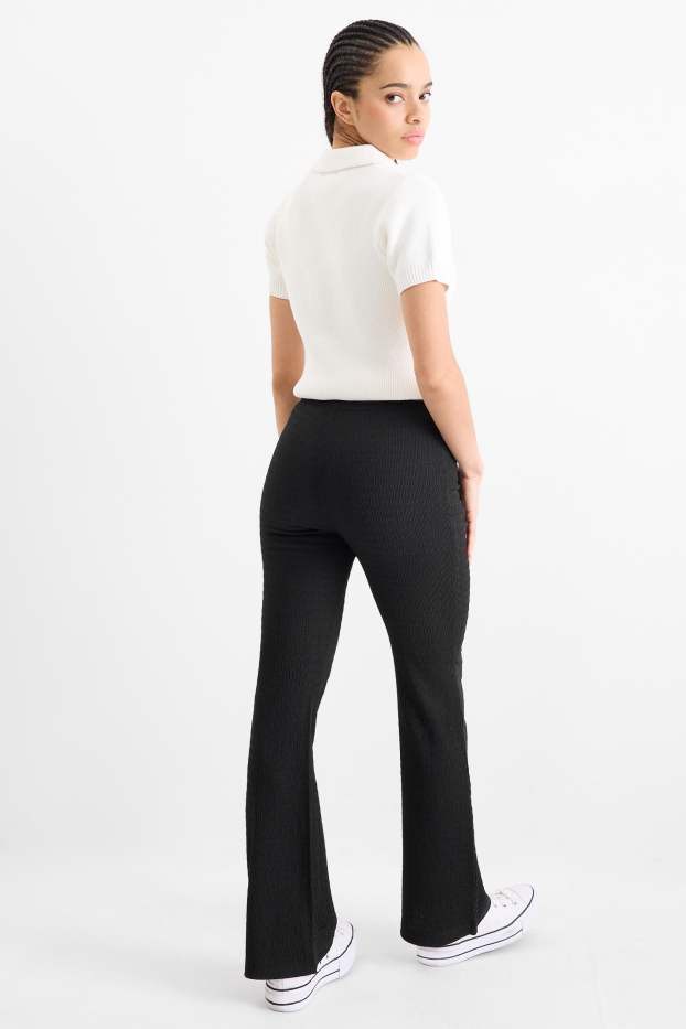 Damen - Flared Leggings - strukturiert - schwarz