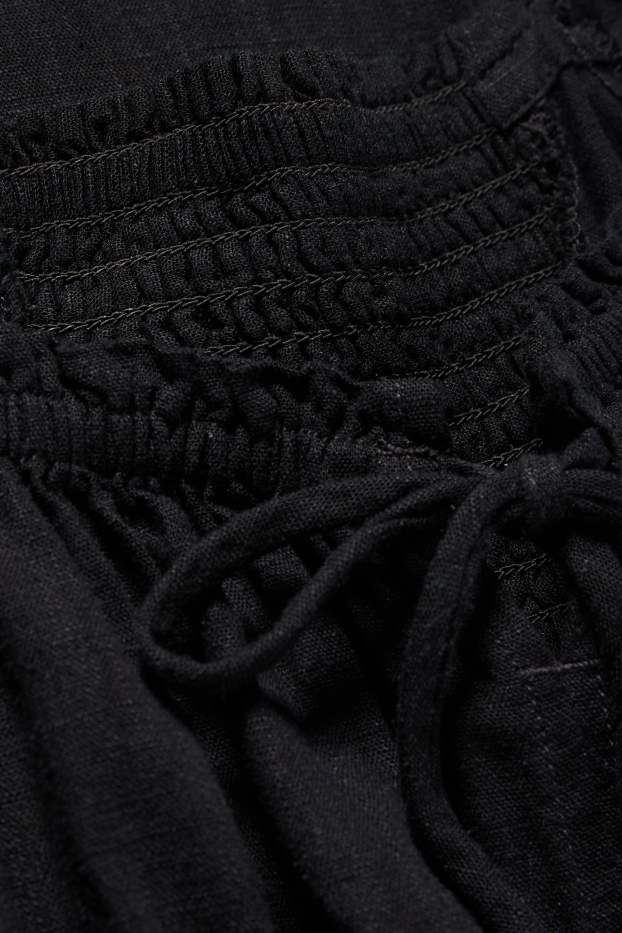 Dona - Vestit amb obertura i component de lli - de punt de niu d'abella - negre