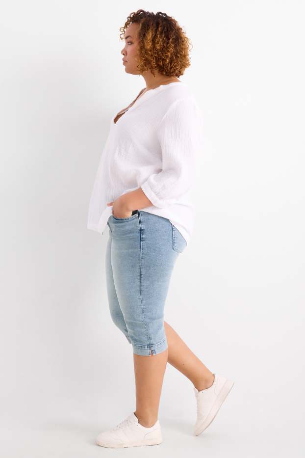 Dámské - Capri džíny - mid waist - slim fit - světle modrá