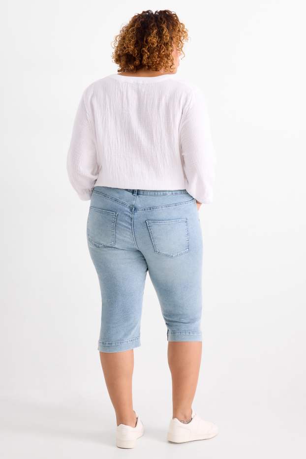 Dámské - Capri džíny - mid waist - slim fit - světle modrá