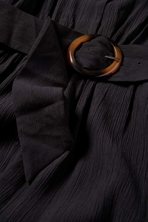 Donna - Tuta con cintura - tessuto tramato - nero