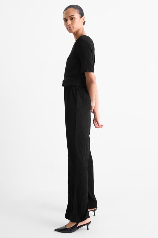 Donna - Tuta con cintura - tessuto tramato - nero