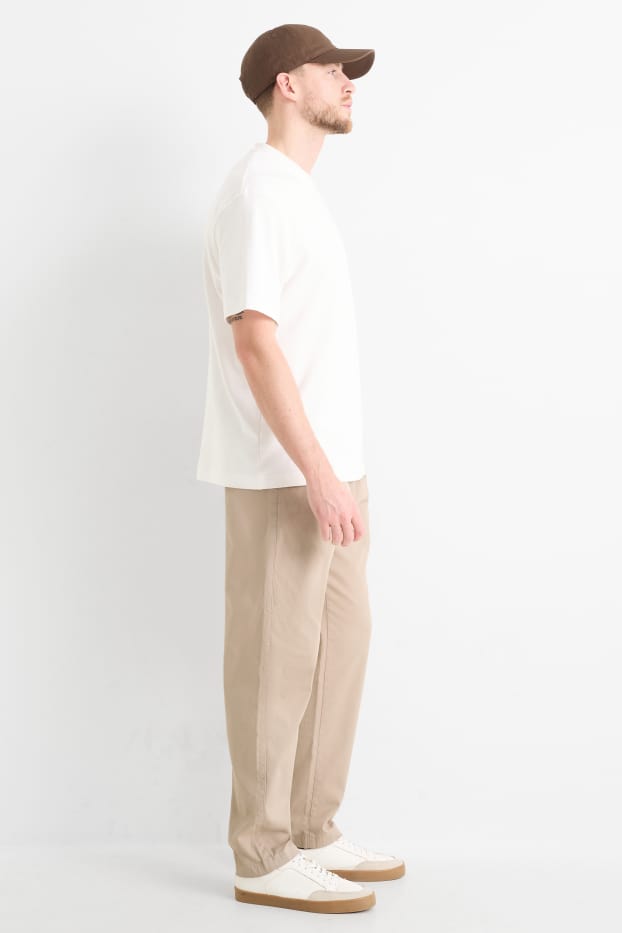 Bărbați - Chino - tapered fit - structurat - bej deschis