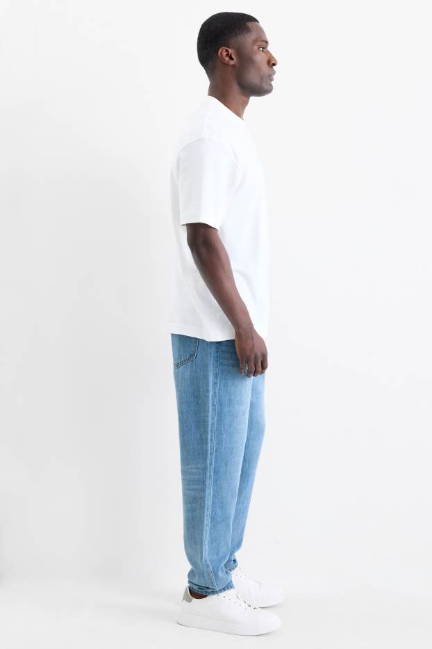 Hommes - Relaxed tapered jean avec teneur en lin - bleu