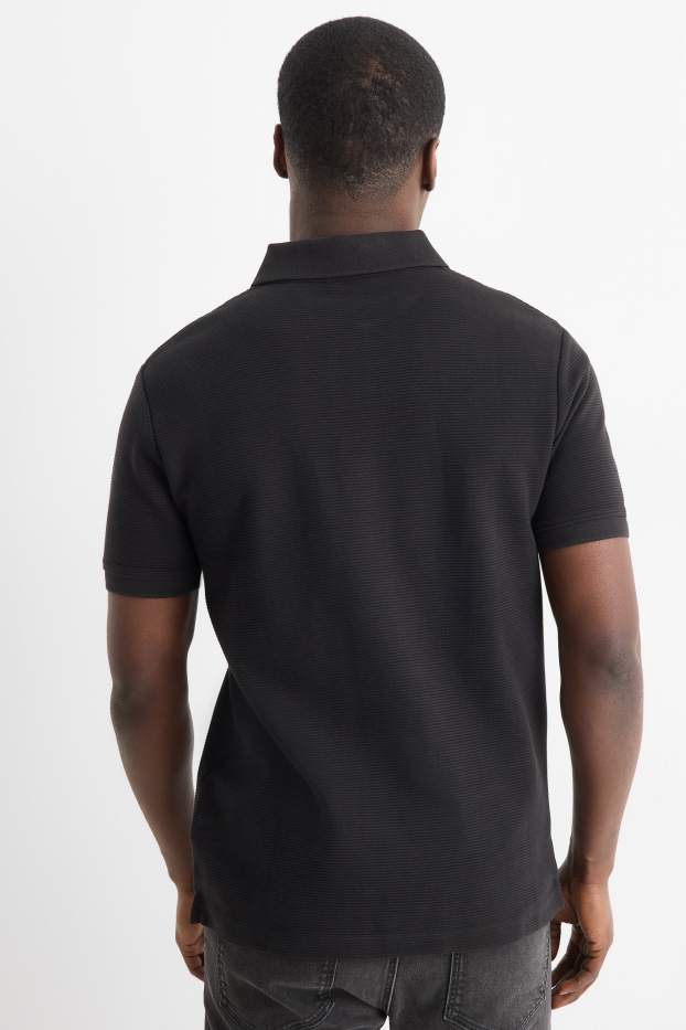Heren - Poloshirt - regular fit - geribd - zwart