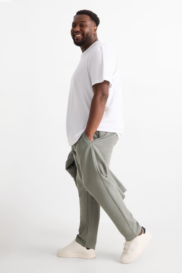 Uomo - Pantaloni sportivi - verde