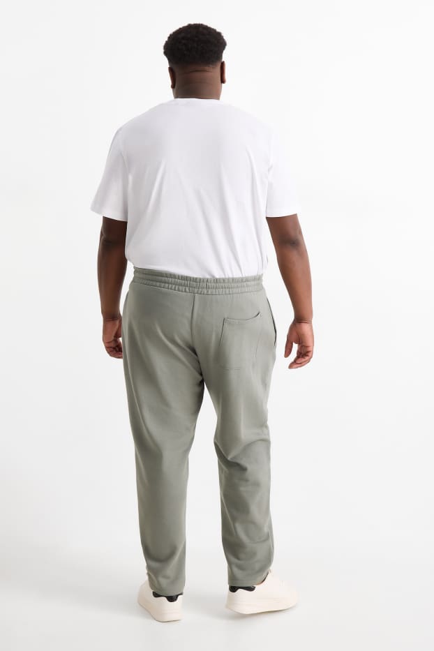 Uomo - Pantaloni sportivi - verde