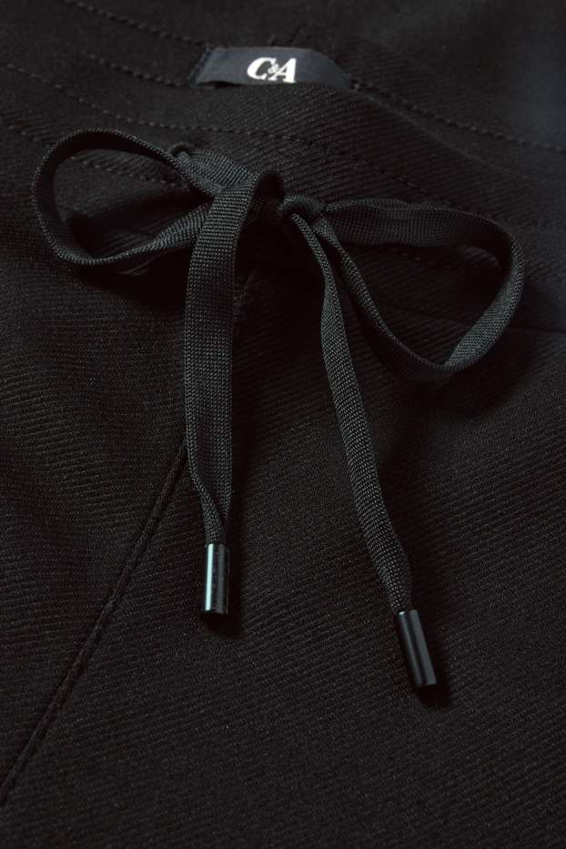 Damen - Stoffhose - Mid Waist - Tapered Fit - schwarz