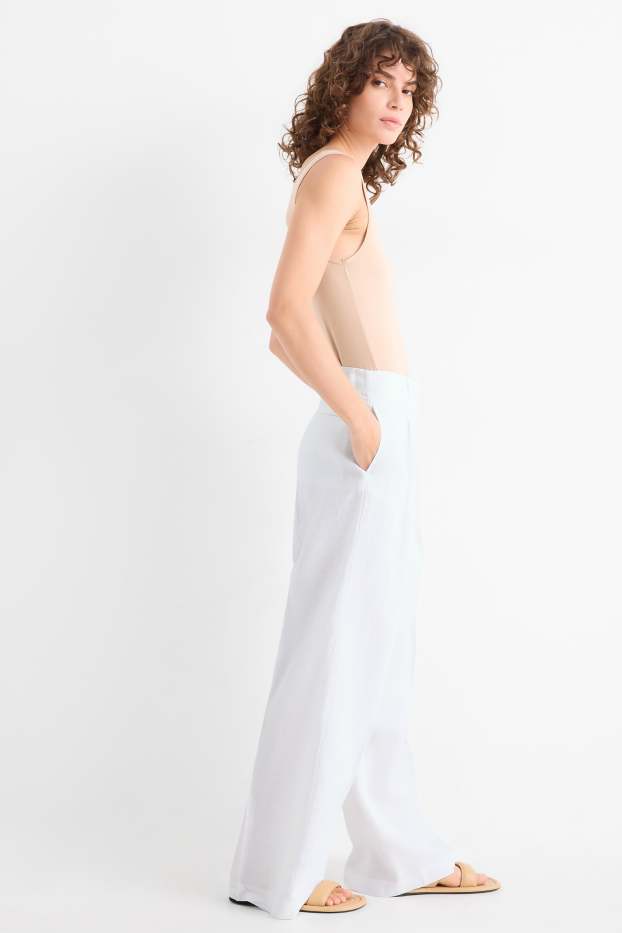 Women - Linen trousers - high waist - wide leg - white