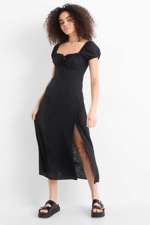 Dona - Vestit amb obertura i component de lli - de punt de niu d'abella - negre