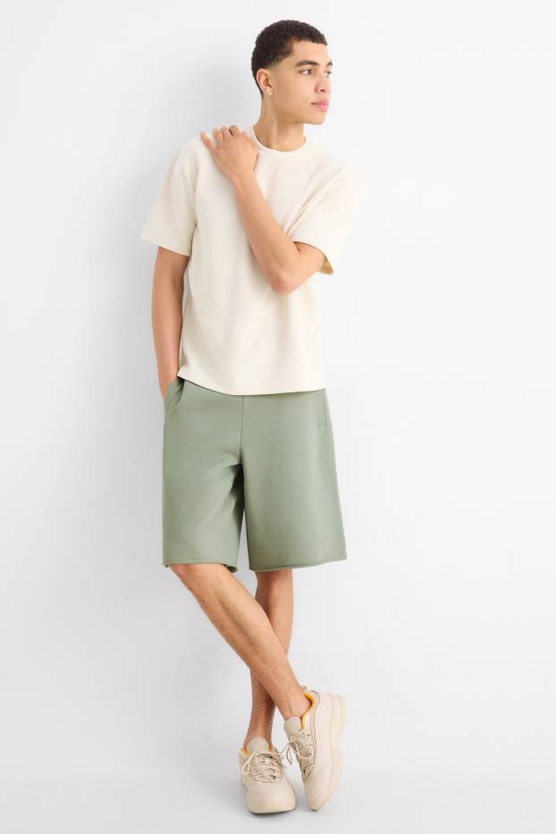 Home - Pantalons curts de xandall - verd clar