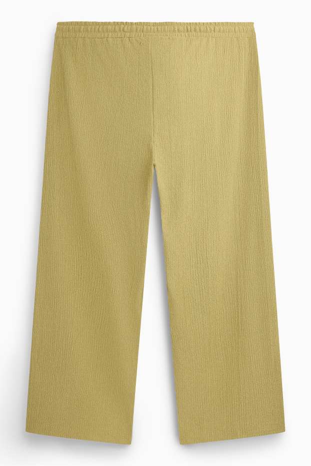 Femei - Pantaloni din jerseu - talie medie - wide leg - structurați - galben