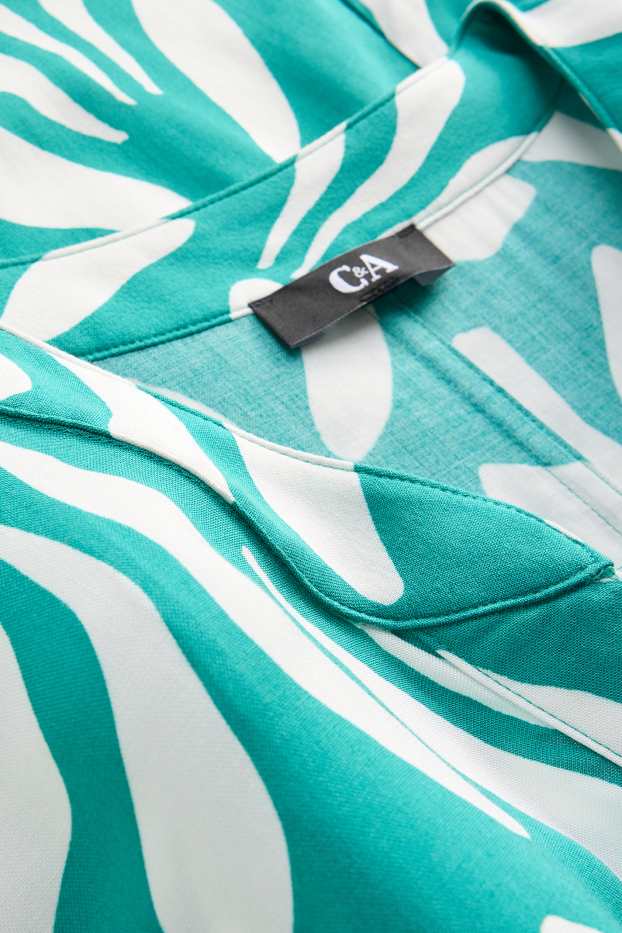Dames - Jurk met V-hals - gebloemd - wit / turquoise