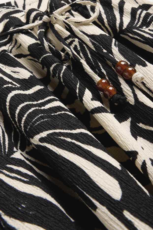 Women - Skirt - patterned - white / black