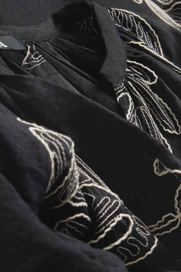 Damen - Bluse mit V-Ausschnitt - gemustert - schwarz