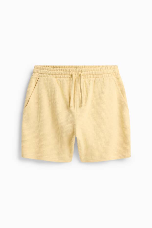 Uomo - Shorts di felpa - tessuto tramato - giallo chiaro