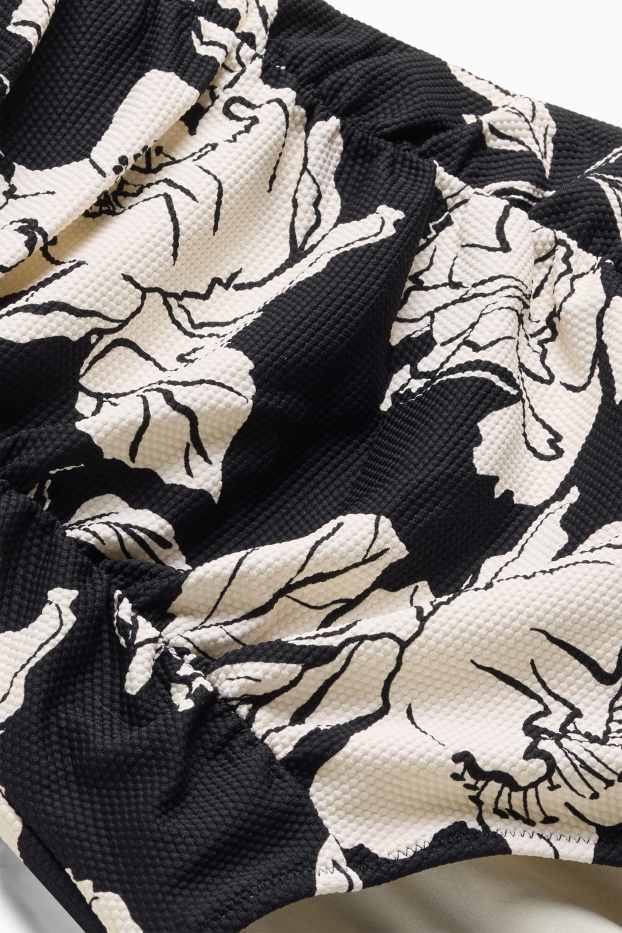 Damen - Shaping-Badeanzug mit Raffung - wattiert - schwarz