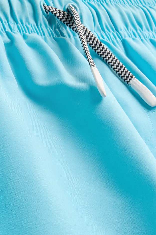 Kinderen: jongens - Surfboard - zwemshort - lichtblauw