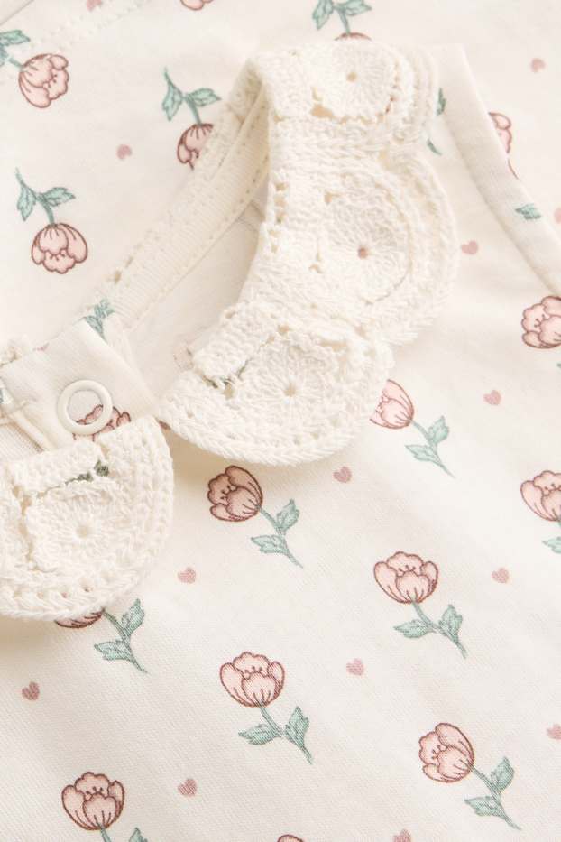 Baby: meisjes - Bloemetje - babyjurk - wit