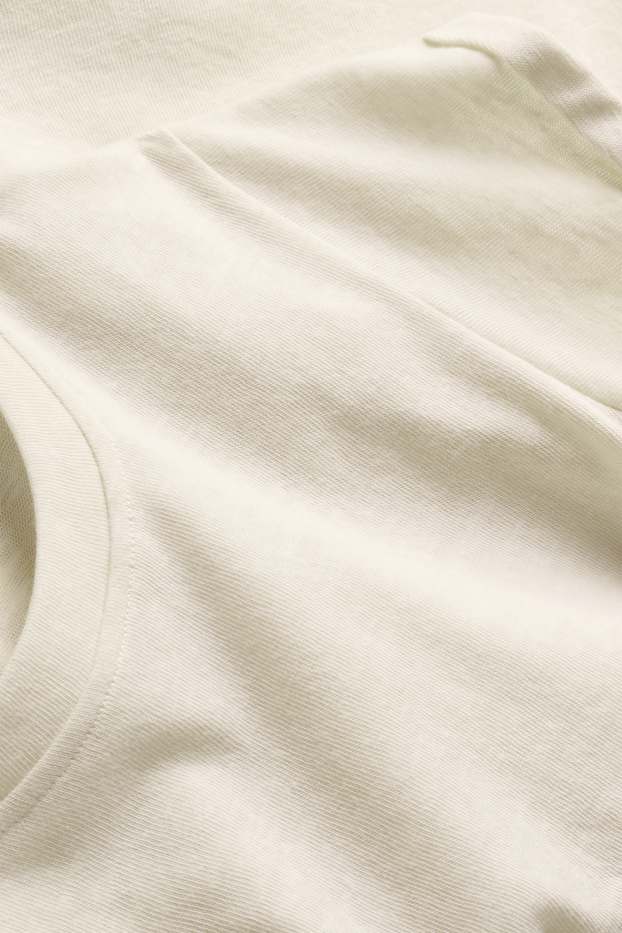 Dames - T-shirt - relaxed fit - crème wit