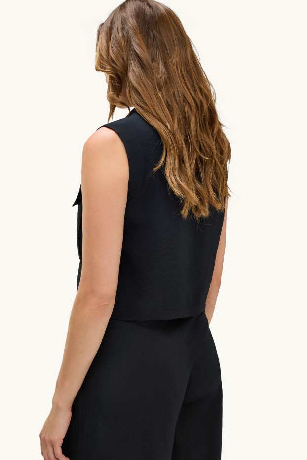 Dona - Armilla - texturada - negre