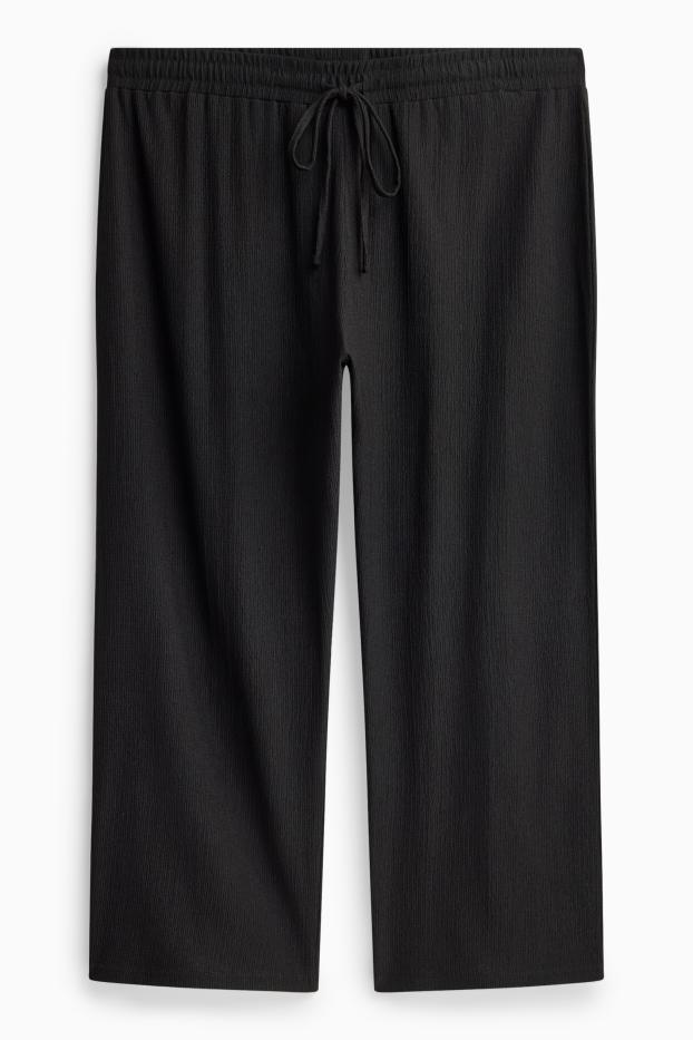 Dames - Jersey broek - mid waist - wide leg - met structuur - zwart