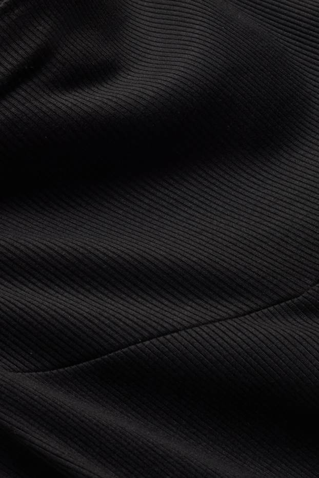 Dona - Pantalons de punt de maternitat - acanalats - negre