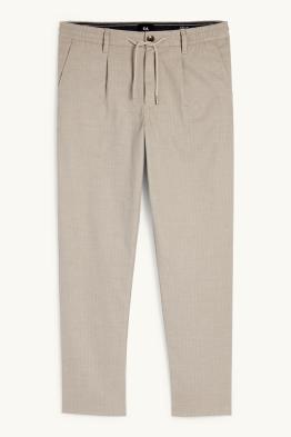 Chinosy - tapered fit - w cienkie paski