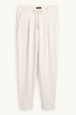 Jersey trousers - mid-rise waist - tapered fit