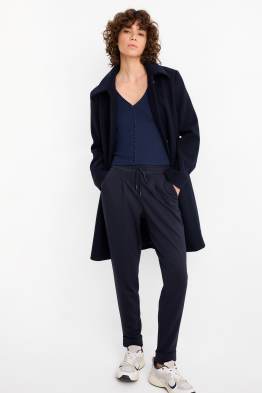 Broek van jersey - mid waist - tapered fit