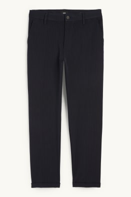 Chinosy - tapered fit - w cienkie paski