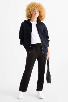 Spodnie z dżerseju - średni stan - tapered fit