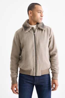 Jacket with faux fur trim